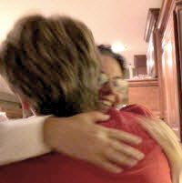 Bernadette hugs Suzanne at<BR> victory celebration