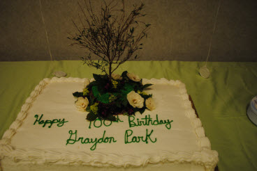 Centennial celebration included a cake<BR>with Graydon’s tree and island